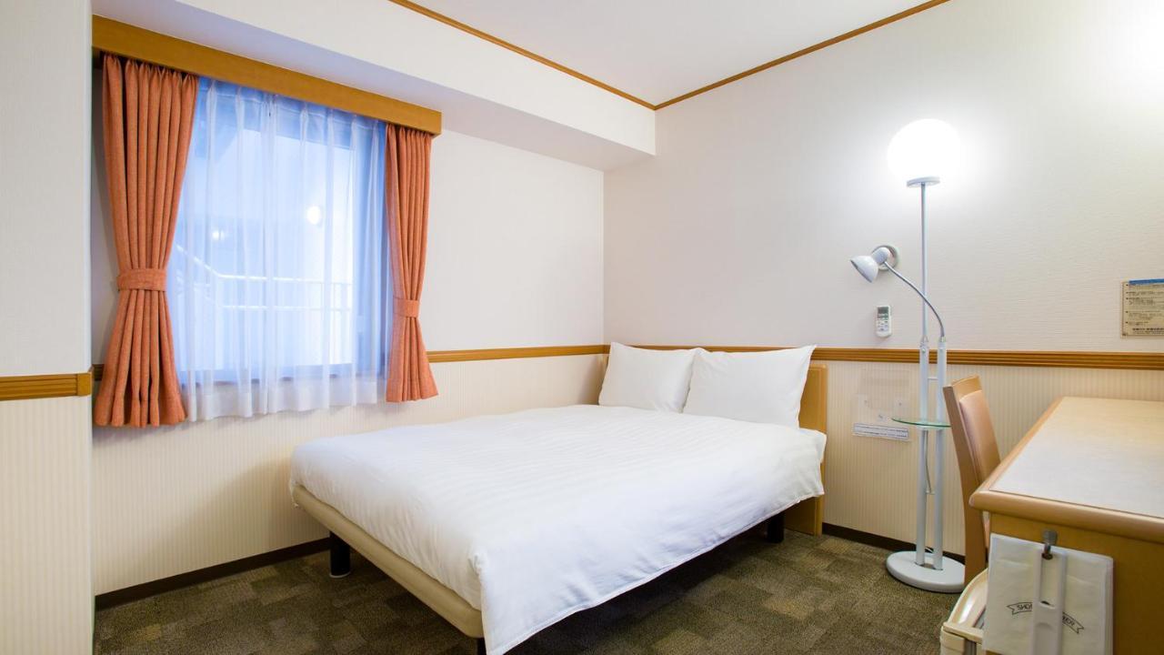 Toyoko Inn Shin-Yatsushiro Ekimae Buitenkant foto